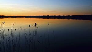willmar, minnesota, united states of america; sunset over a lake