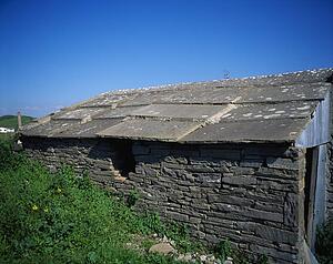 Liscannor, Co Clare, Ireland; Traditional Irish Cottage With A Slated Roof