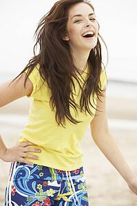 Happy Teenage Girl Having Fun On Beach