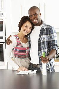Young Couple Cleaning Cleaning Modern Kitchen 