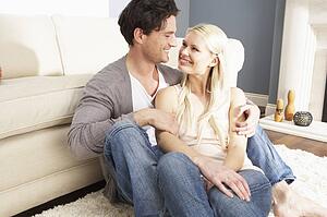 Romantic Young Couple Relaxing Together At Home 
