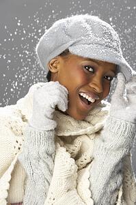 Fashionable Woman Wearing Knitwear And Cap In Studio
