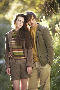 Portrait Of Romantic Young Couple In Autumn Landscape