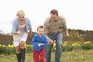 Family Having Egg And Spoon Race
