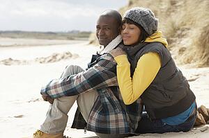 Romantic Young Couple On Winter Beach