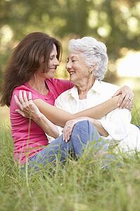 Senior Woman With Adult Daughter In Park