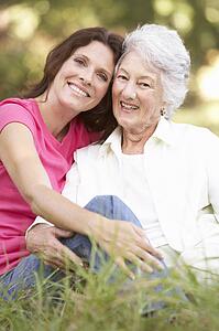 Senior Woman With Adult Daughter In Park