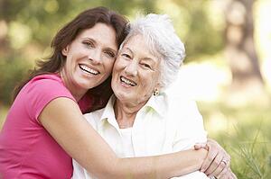 Senior Woman With Adult Daughter In Park