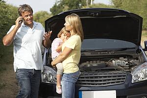 Family Broken Down On Country Road