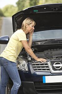 Female Driver Broken Down On Country Road