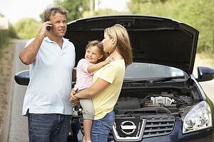 Family Broken Down On Country Road