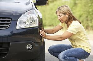 Female Driver Broken Down On Country Road