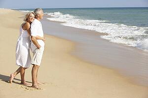 Senior Couple Enjoying Beach Holiday