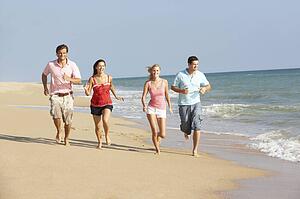 Group Of Friends Enjoying Beach Holiday