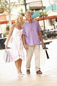 Senior Couple Enjoying Shopping Trip 