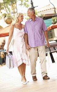 Senior Couple Enjoying Shopping Trip 
