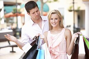 Man Frustrated With Woman On Shopping Trip Together