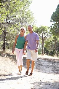 Senior couple, holding hands, walking, walk in park