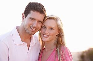 Romantic Young couple in love at sunset