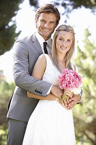 Portrait Of Bridal Couple Outdoors