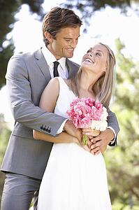 Portrait Of Bridal Couple Outdoors