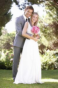 Portrait Of Bridal Couple Outdoors