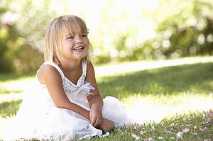 Young girl posing in park