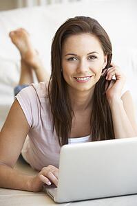 Young woman on her laptop computer