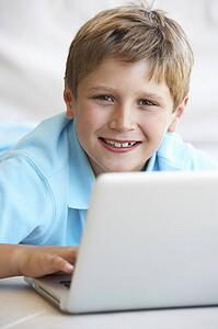 Young boy on his laptop computer