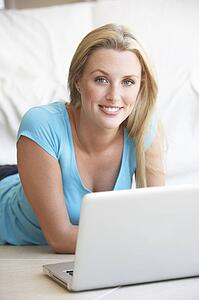Young woman on her laptop computer