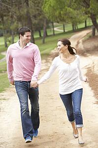 Couple having fun in park