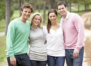 Group of friends enjoying walk in park