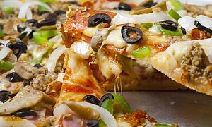 Pizza With A Variety Of Toppings