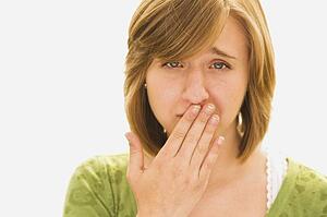 woman looking embarrassed