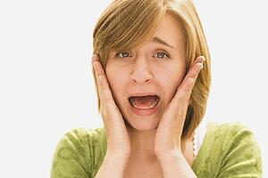woman looking surprised