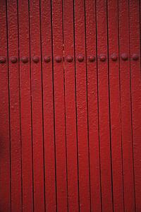 a red wall with rivets; troutdale, oregon, united states of america