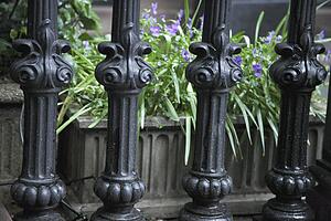 ornate railing with a flower box behind; troutdale, oregon, united states of america