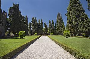 gravel path in the center of a garden; conigliano, veneto, italy