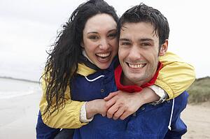 Happy couple on beach in love