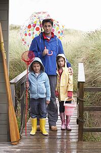 Father with children on beach