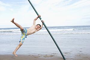 Teenagers playing on beach