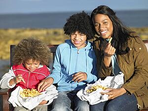 Happy family having picnic
