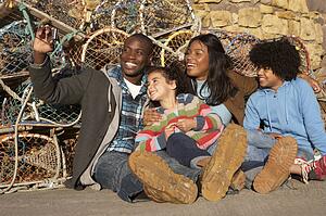 Happy family taking photo