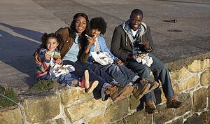 Happy family having picnic