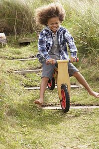 Happy boy riding a bike