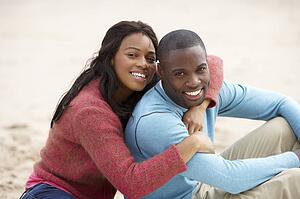 Young couple Embracing on beach