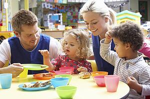 Couple and children playing with toys