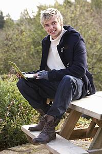 Young man with laptop computer