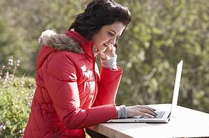 Young woman with laptop computer