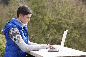 Young woman with laptop computer